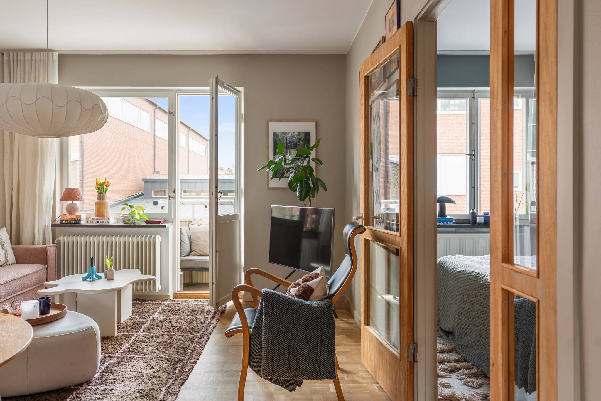 living room with pink sofa scandinavian decor 1950s apartment