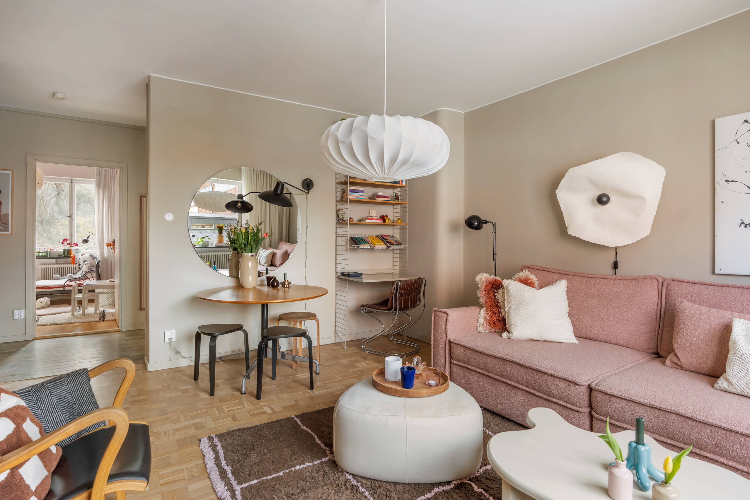 living room with pink sofa scandinavian decor 1950s apartment