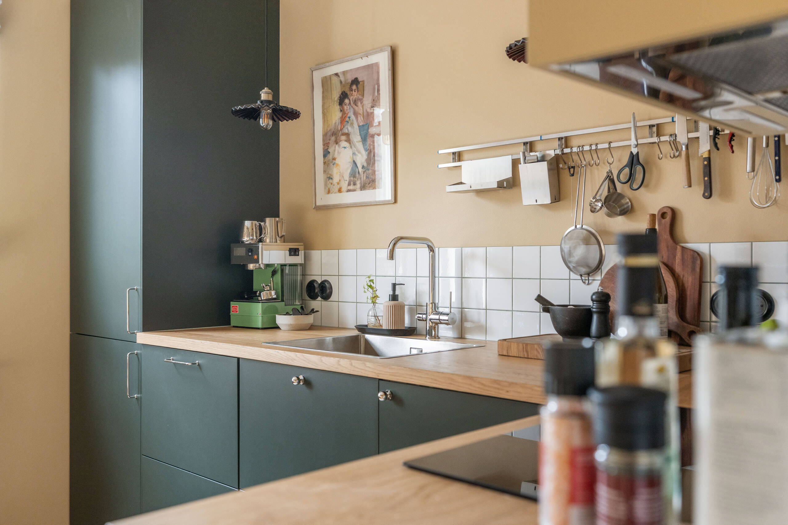 green kitchen with dining room ochre walls