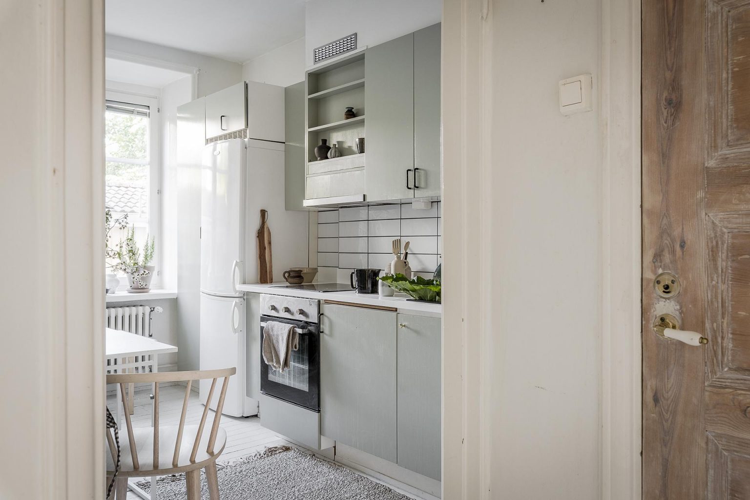 cuisine vert pâle studio 32m2 décoration scandinave