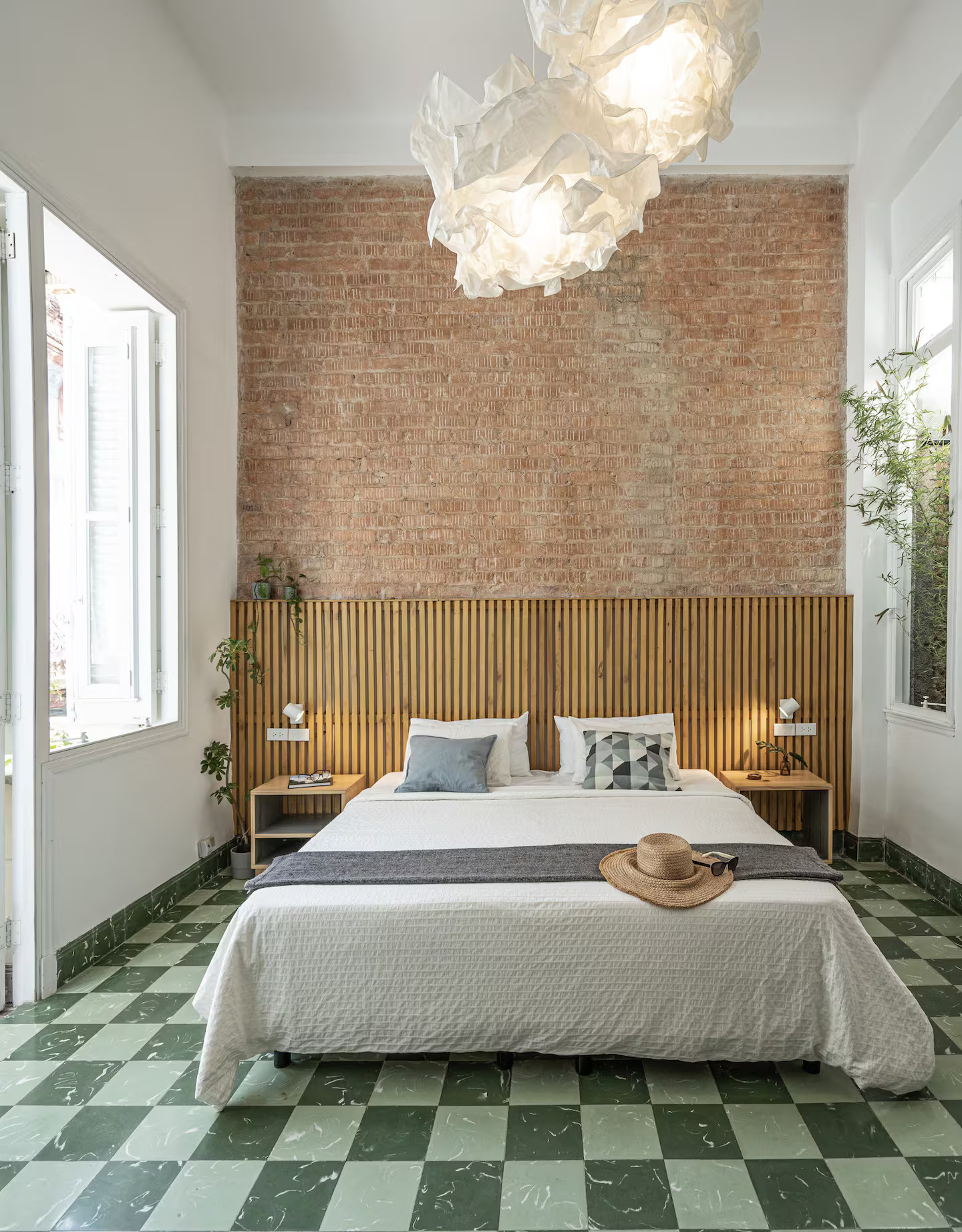 bedroom with bricks wall apartment with patio in the heart of Havana