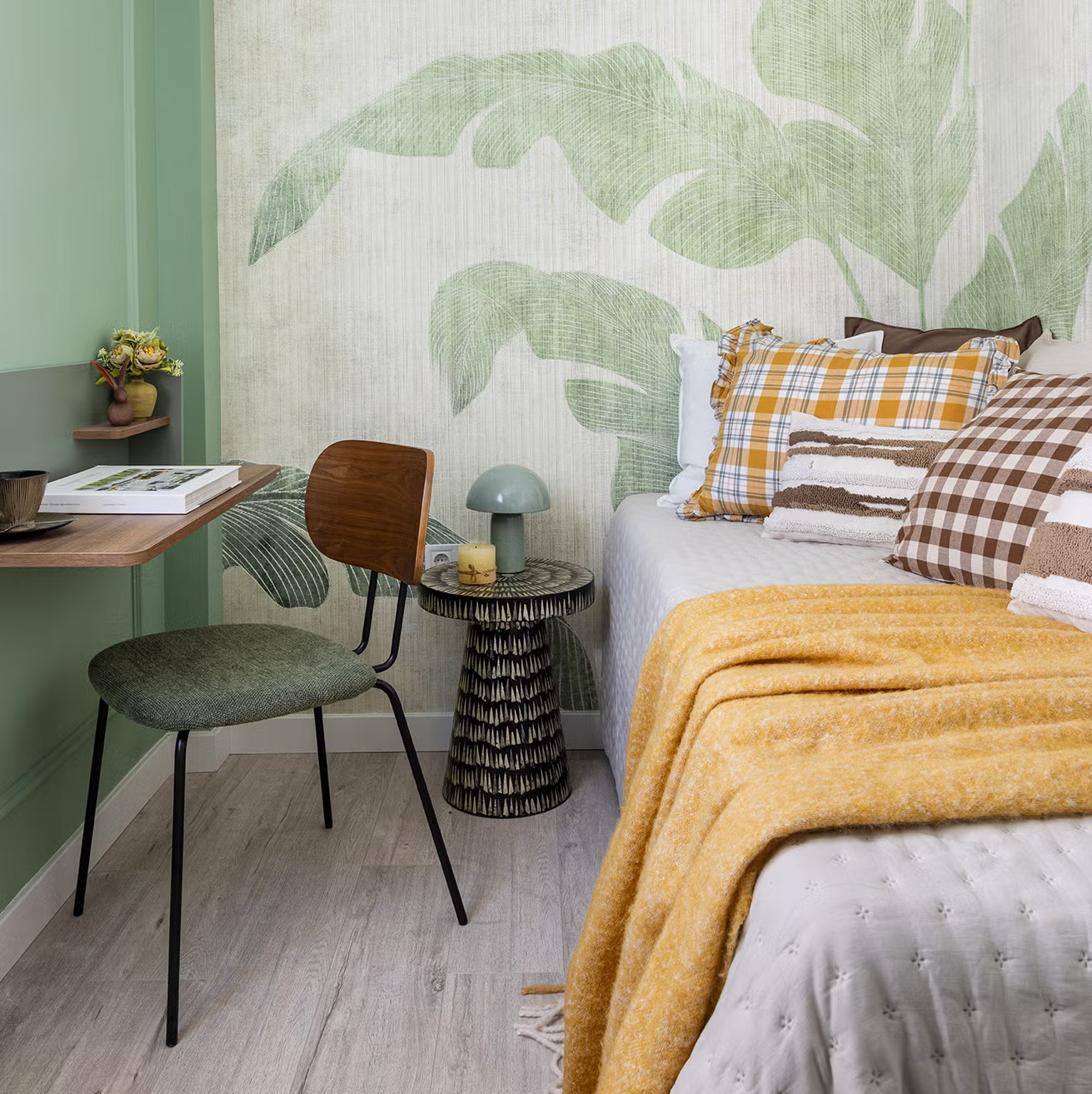 modern bedroom with wallpaper with a plant motif 58sqm apartment in Madrid
