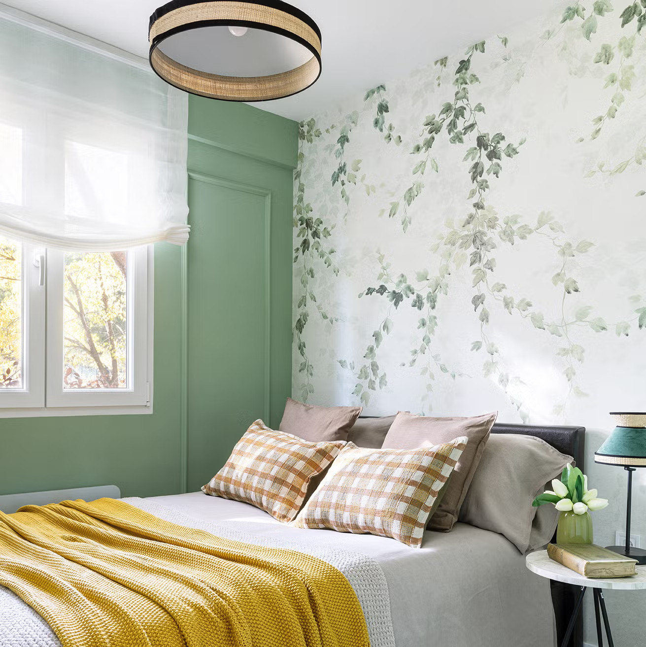 modern bedroom with wallpaper with a plant motif