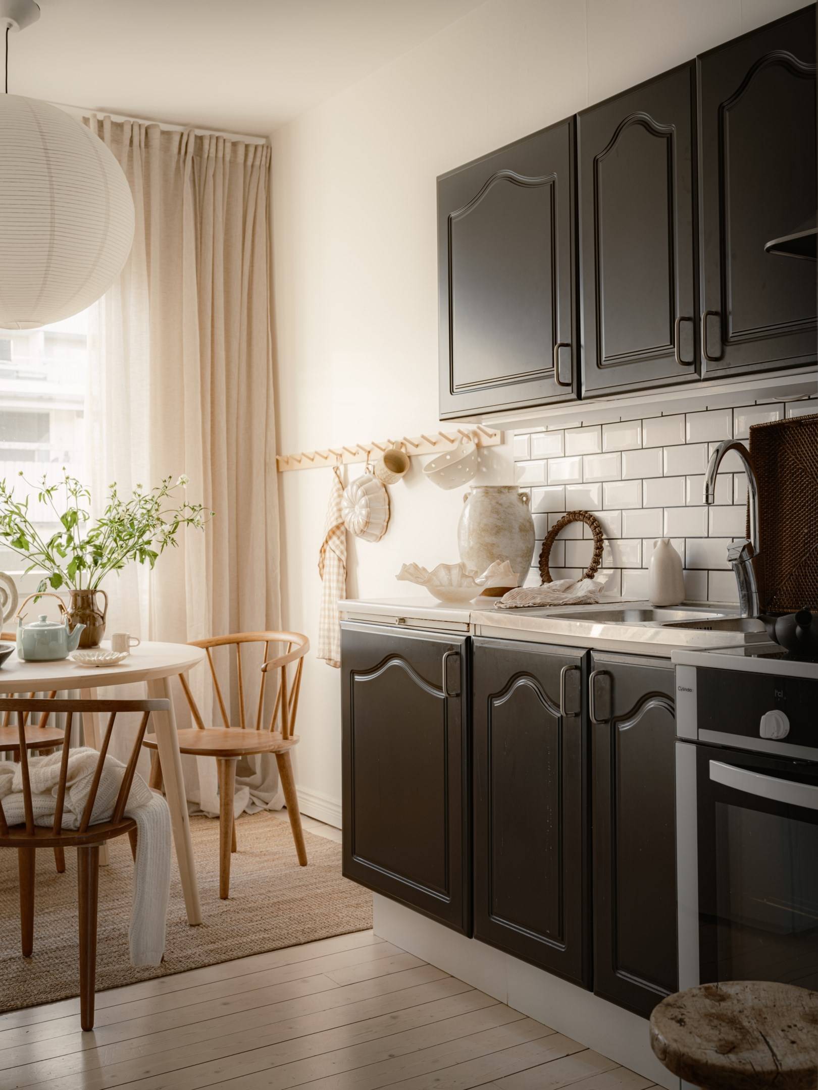black classic kitchen rustic feel 34sqm studio scandinavian decor neutral tones