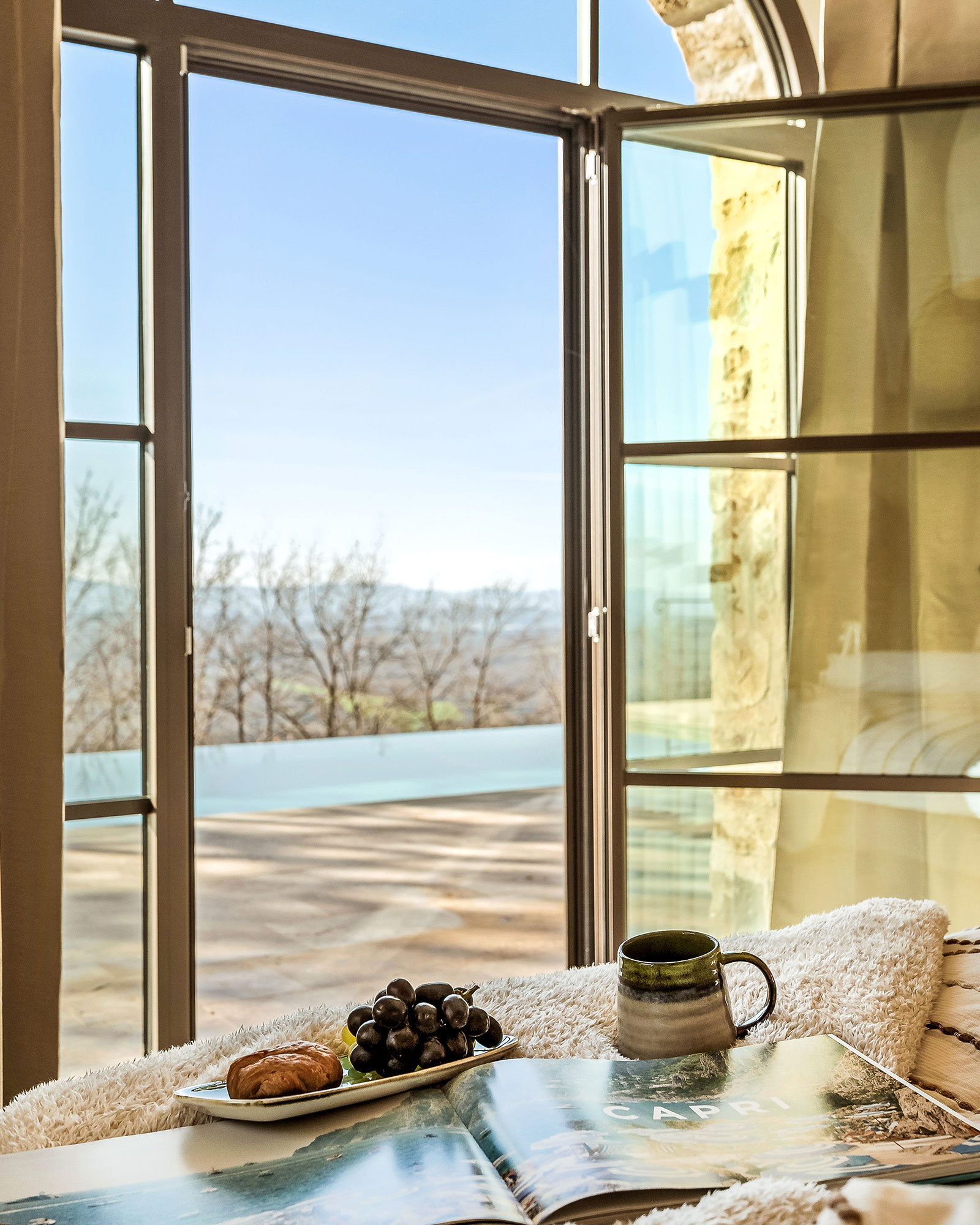 bedroom with arched window La Torre Umbria bedroom with arched window La Torre Umbria