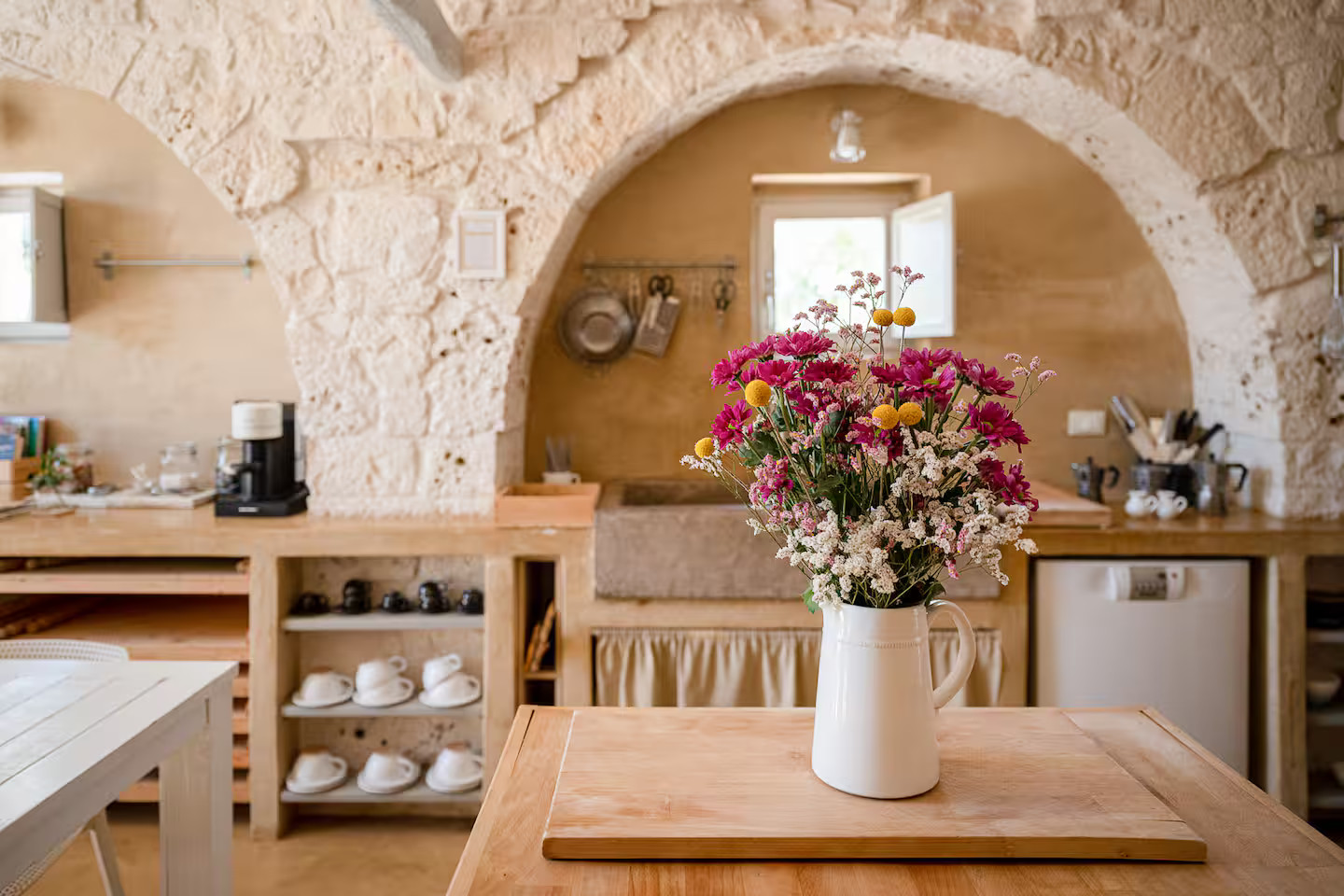 kitchen with archs and stone walls Villa Coki