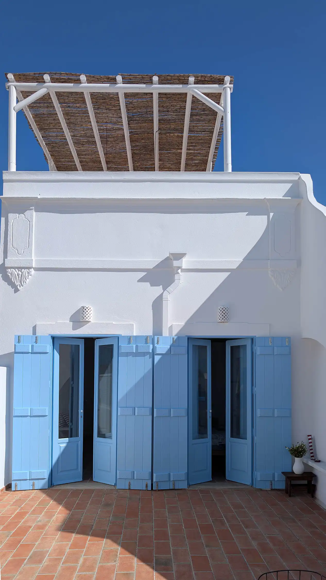 terrace with pergola former fisherman’s house with a pool rustic decor Casa da Brica Portugal