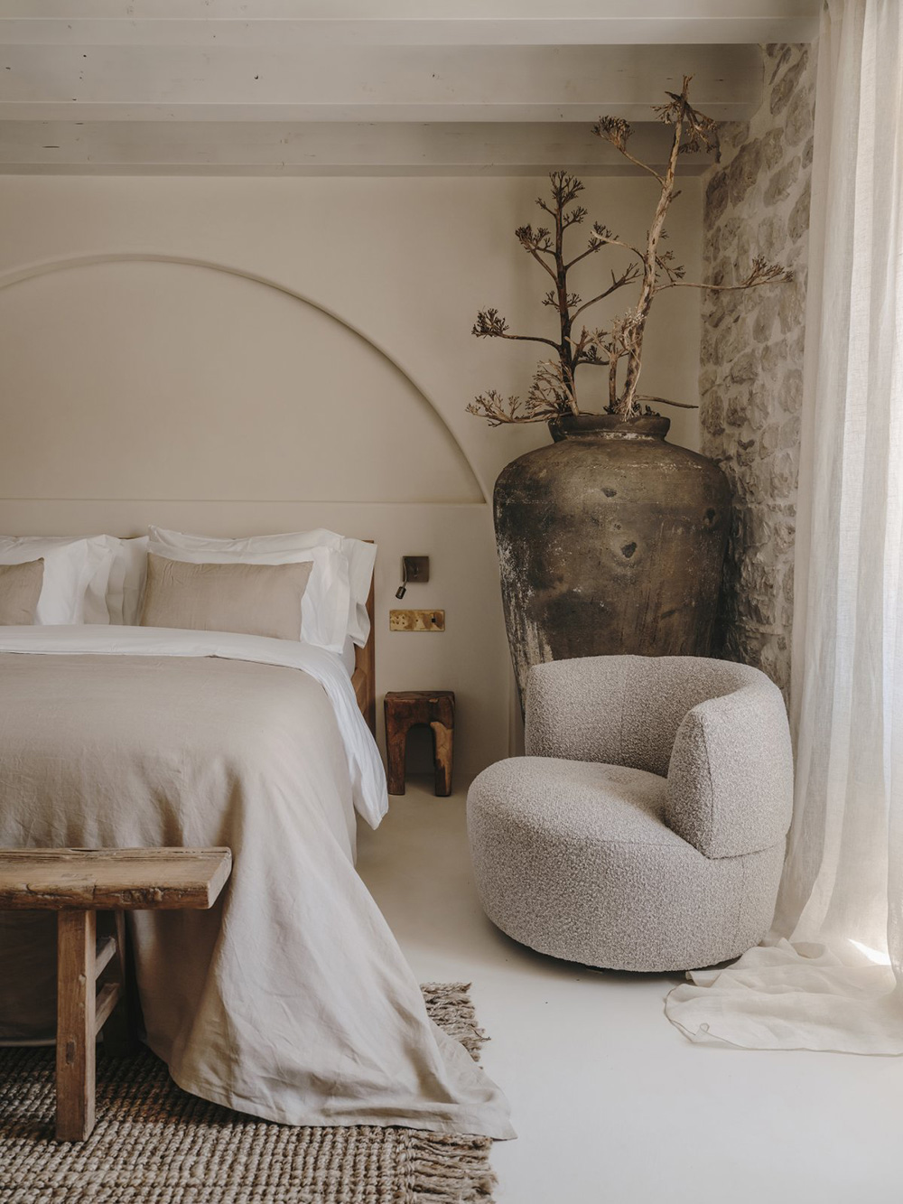 bedroom stone walls beige decor Palazzo Caterina Hvar Croatia19th-century palace