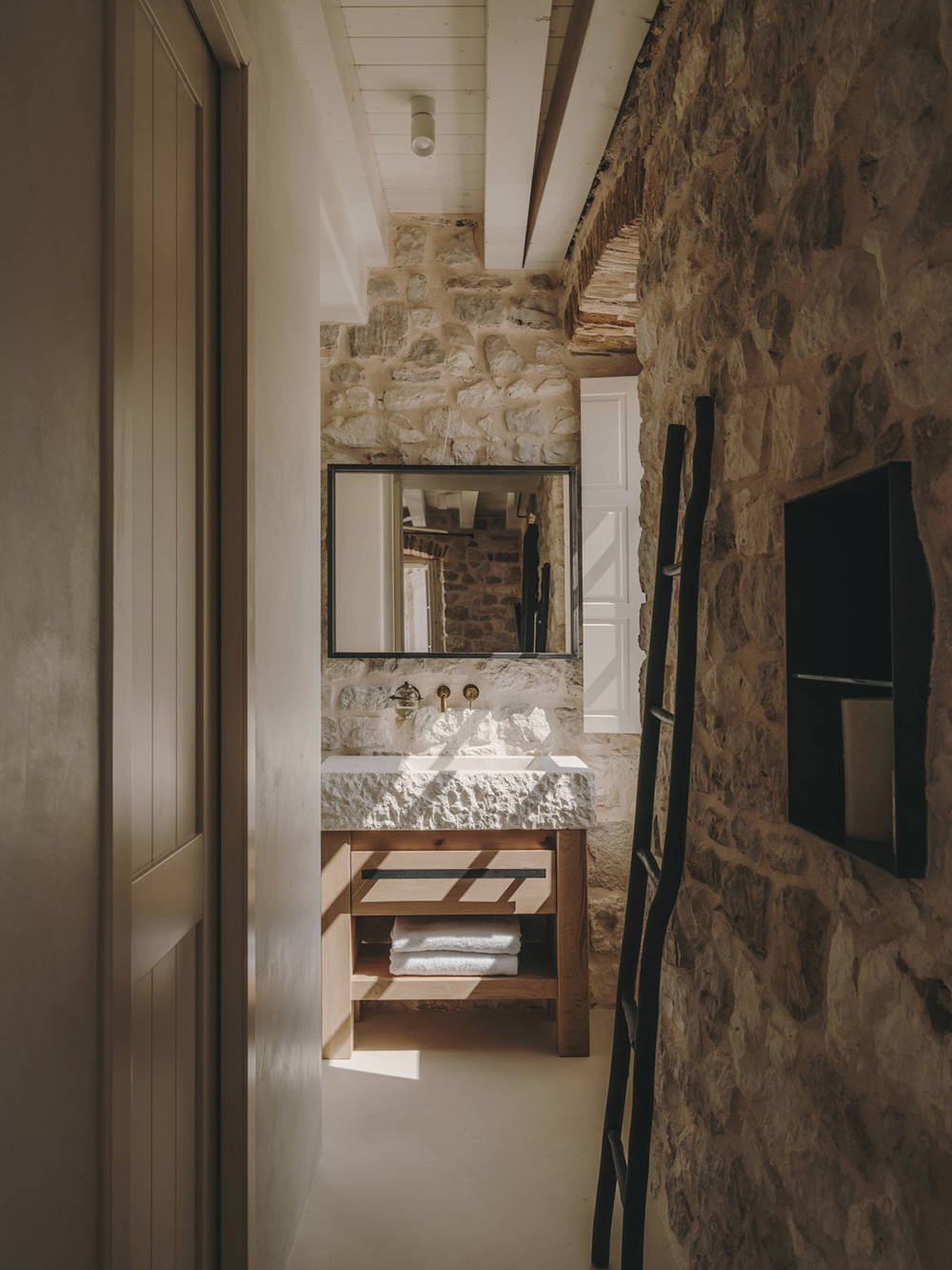 bathroom with stone walls Palazzo Caterina Hvar Croatia