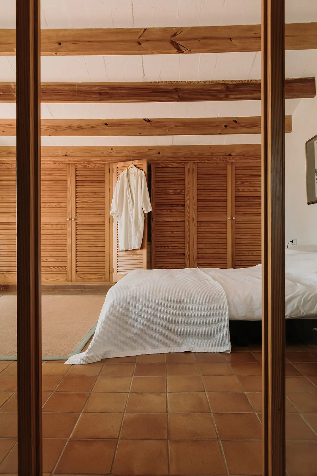 chambre avec poutres finca du 19e siècle rénovée maison Minorque