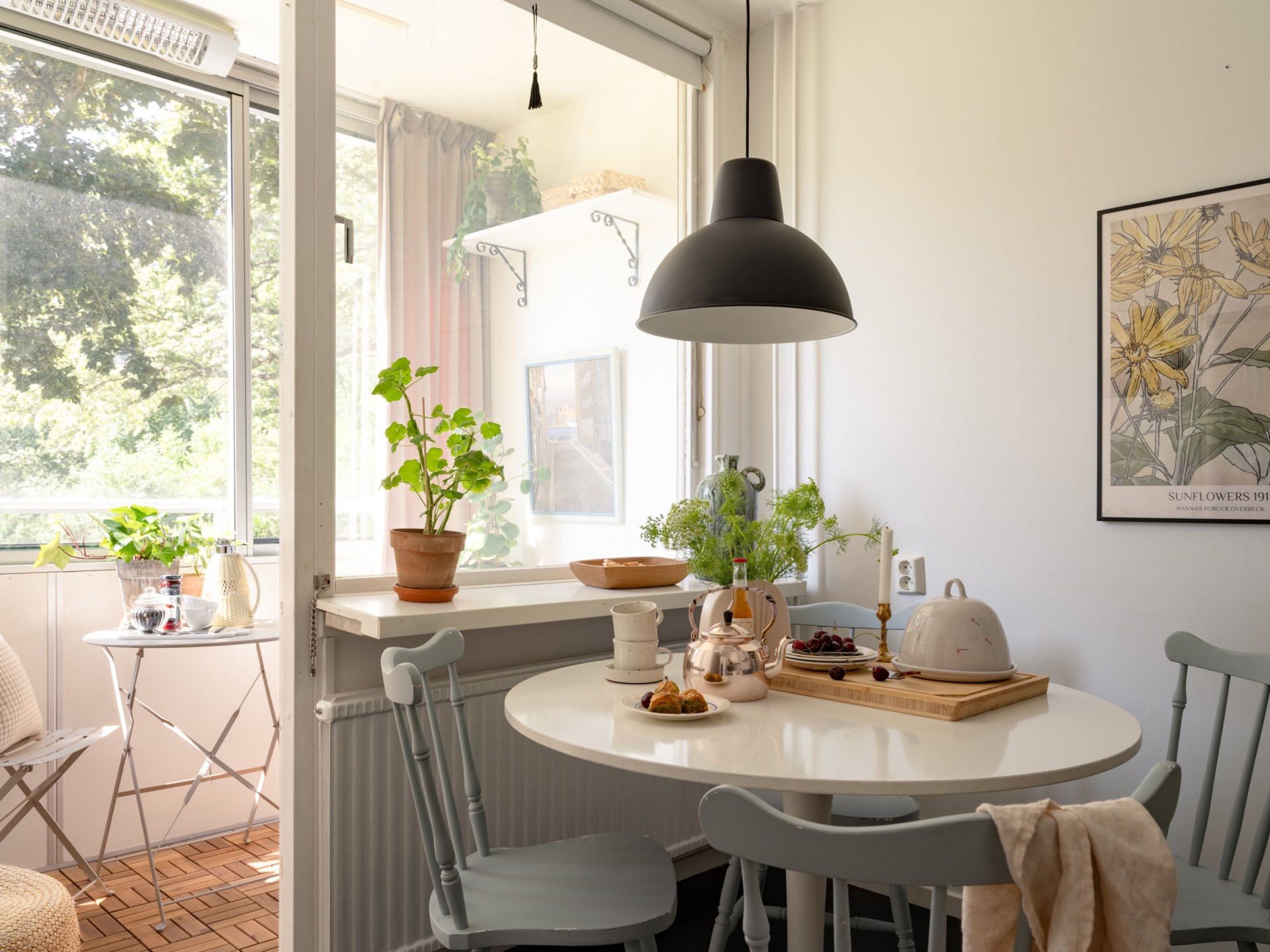 dining room with glazed balcony