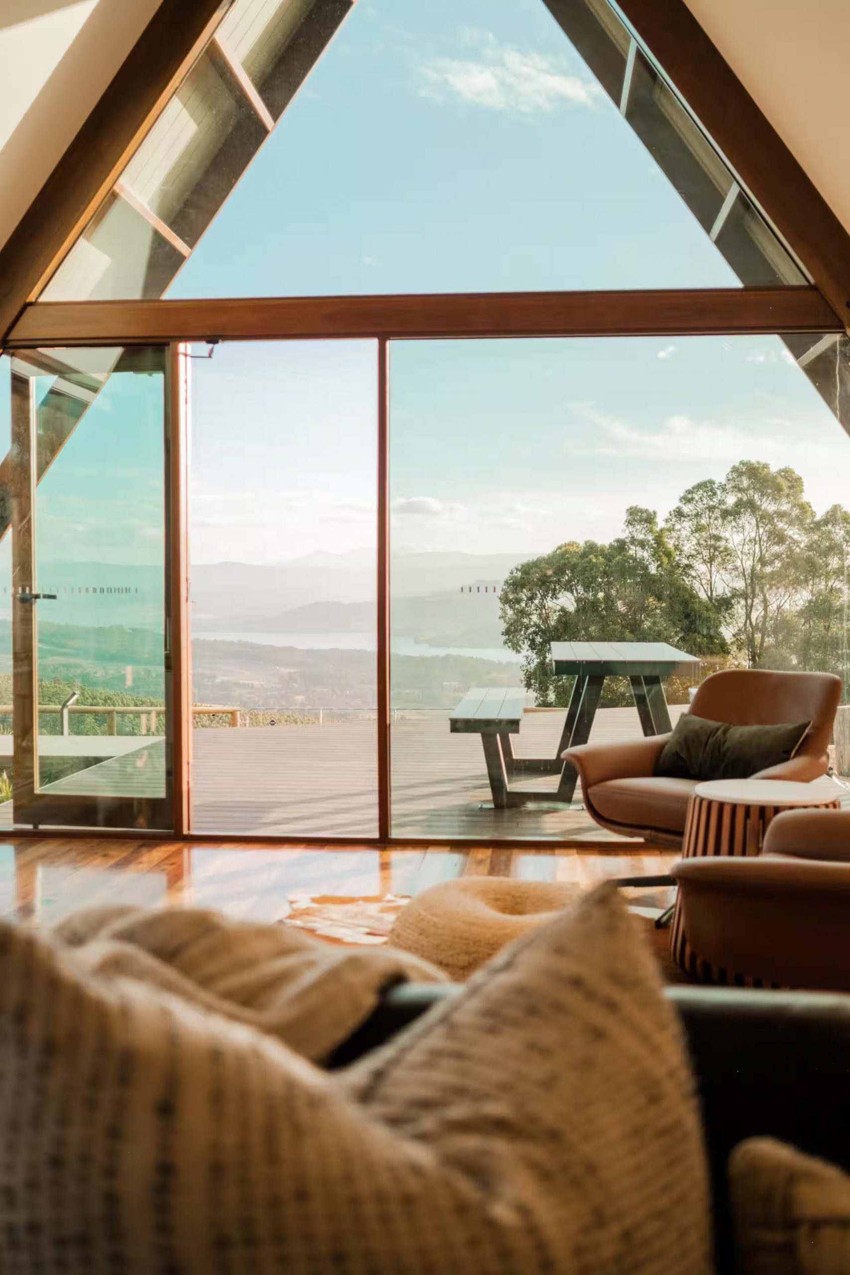 living room off-grid wooden A-Frame house in Tasmania living room off-grid wooden A-Frame house in Tasmania