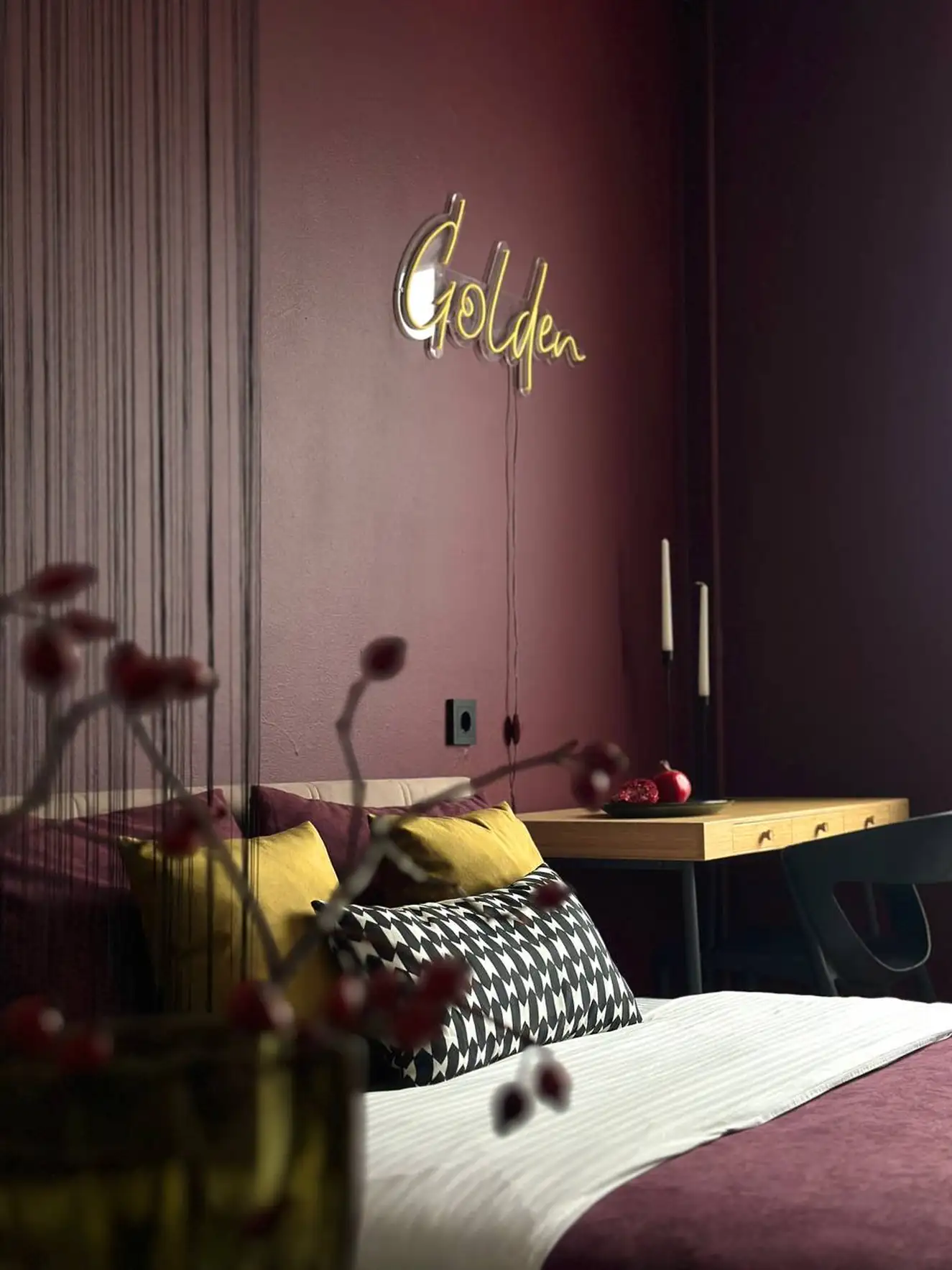 bedroom with colour blocking in green and burgundy 37sqm studio contemporary decor