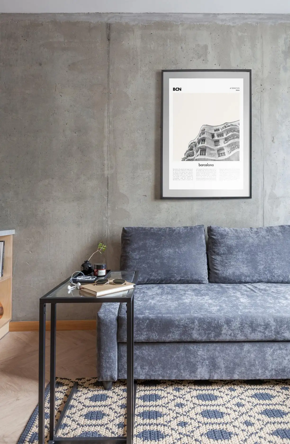living room with concrete wall in 45sqm apartment with a glass brick partition