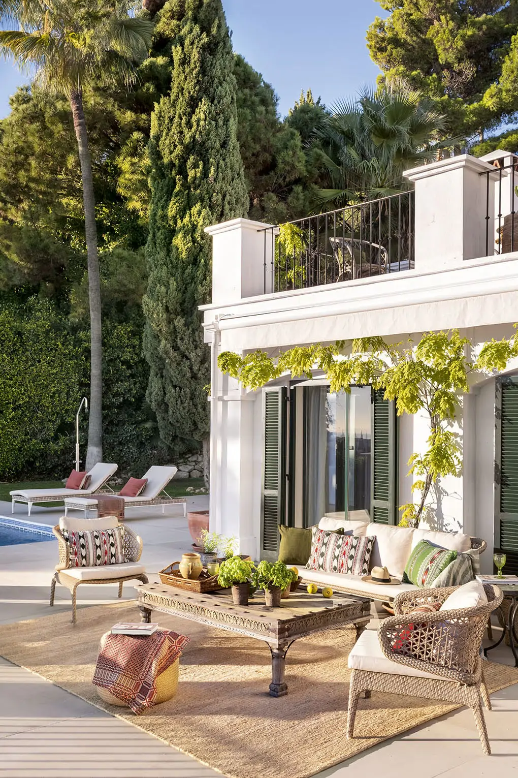 terrace with pool and outdoor living room ethnic chic decor