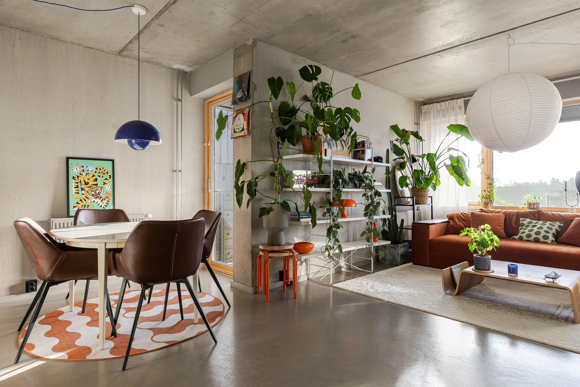 dining room and living room with concrete floor walls and ceiling 48sqm two-room apartment Scandinavian decor