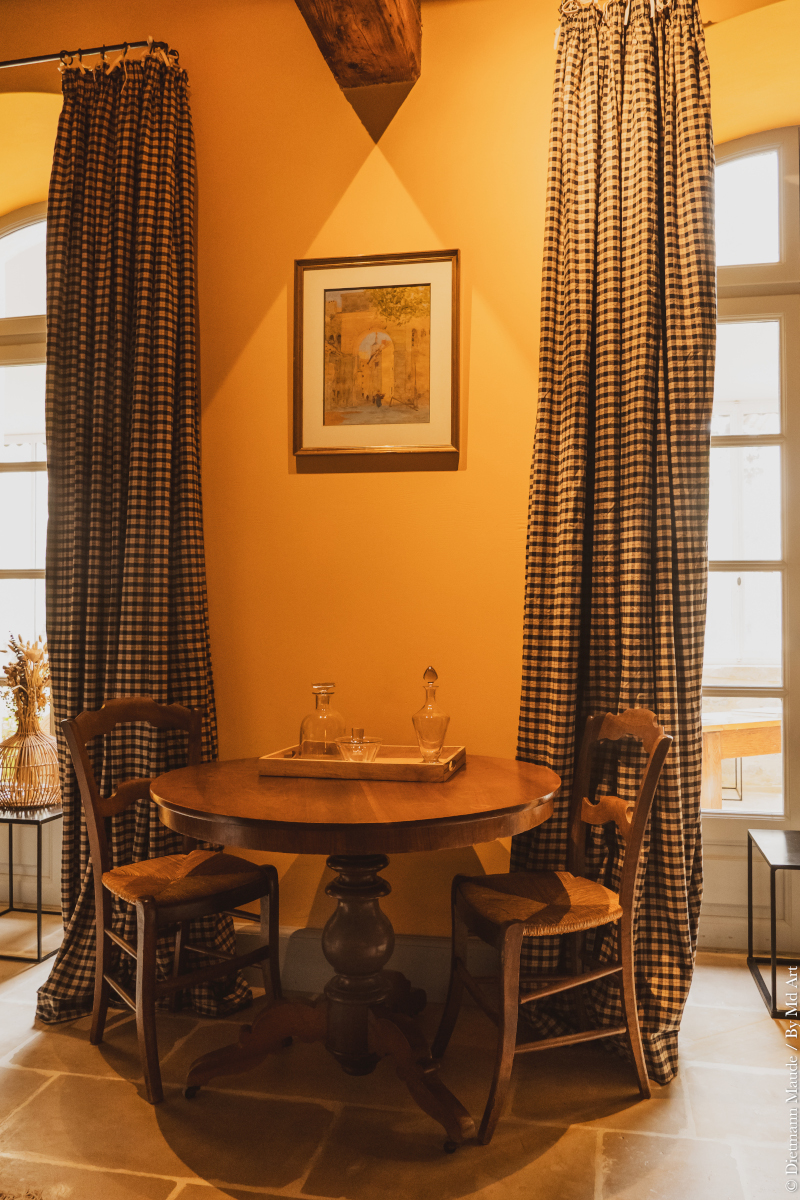 dining room with beams and stone historic fireplace Provence