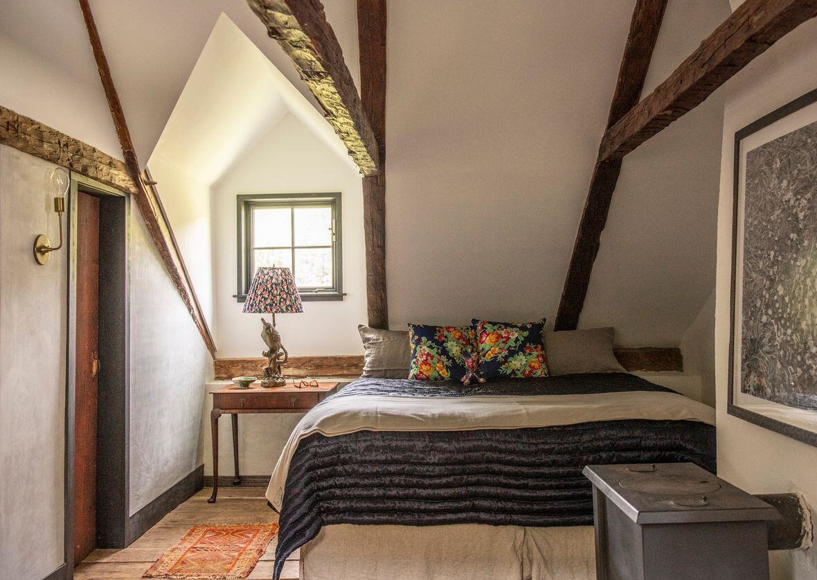 attic bedroom with beams
