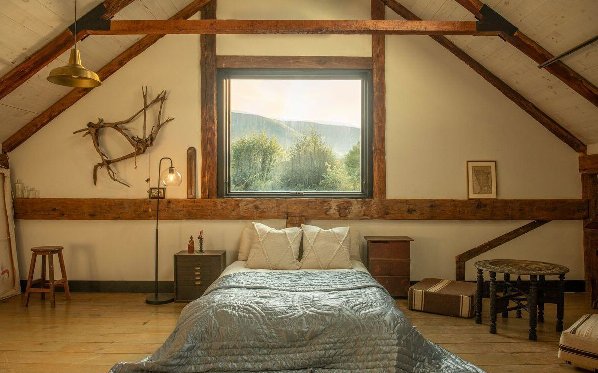 attic bedroom with beams