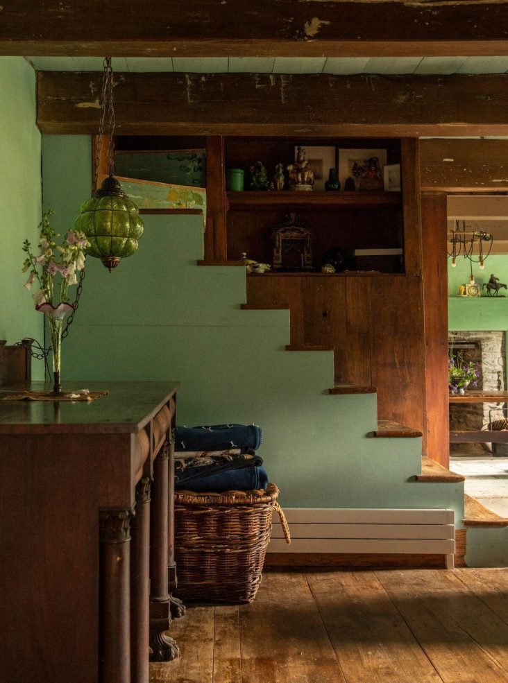 Entrance with stairs and beams rustic chic decor 18th-century house in the Catskills