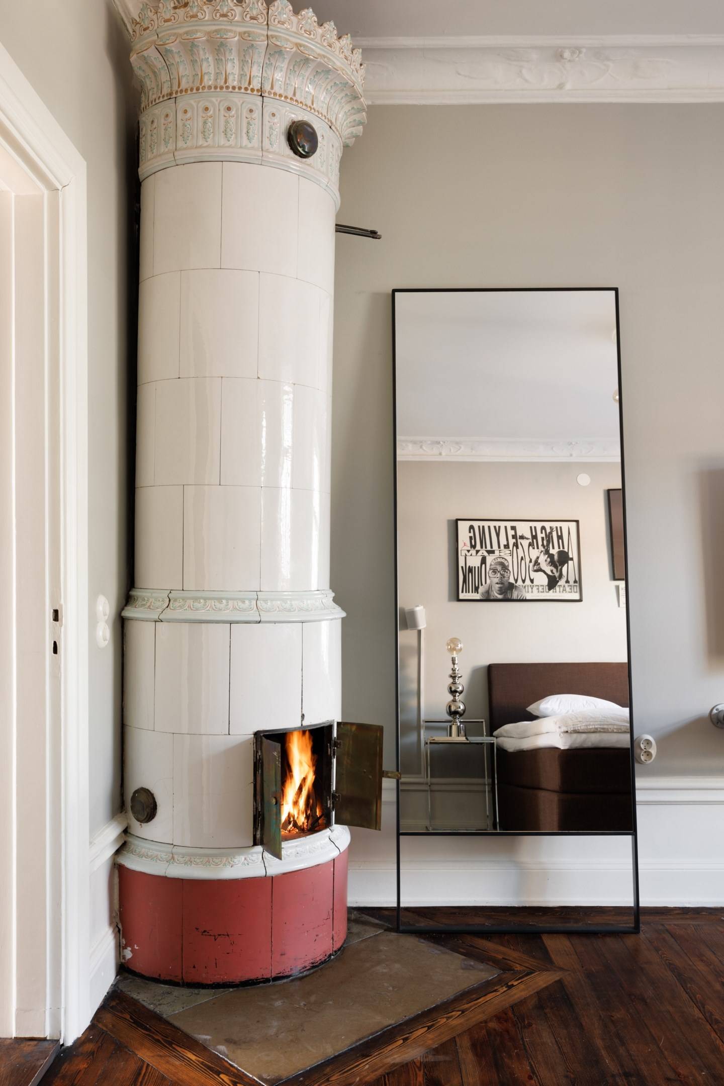 bedroom with Scandinavian stove 1960s vintage decor