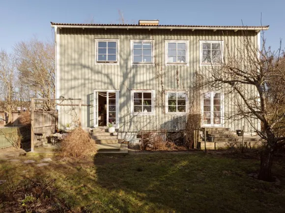 maison bois Suède façade vert sauge